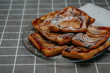 puff pastry puffs with Apple, cinnamon and powdered sugar