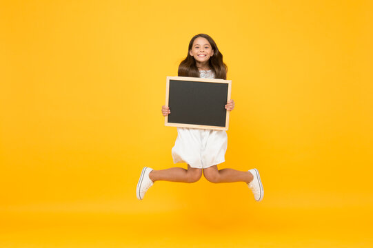 So Excited. Blank Blackboard. Something You Need To Know. Happy Smiling Girl Hold Blackboard. Small Kid With Blackboard. Advertisement Promotion Copy Space. Good News. Chalkboard For Information