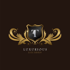 Golden T Logo Luxurious Shield, creative vector design concept for luxury brand identity.