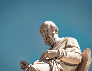 Plato the ancient Greek philosopher white marble statue on sky background, Athens Greece