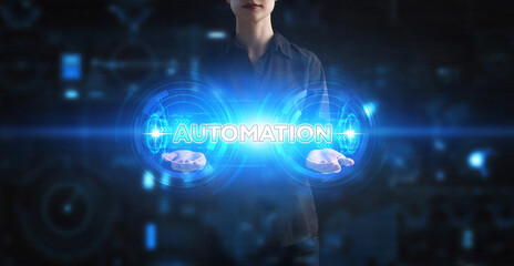 Business, Technology, Internet and network concept. Young businessman working on a virtual screen of the future and sees the inscription: Automation
