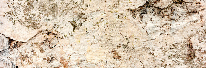 Texture of a concrete wall with cracks and scratches which can be used as a background