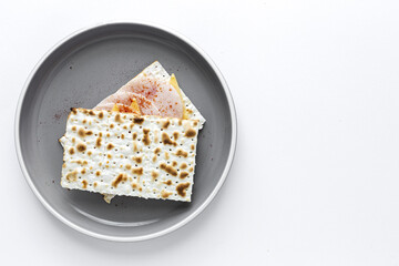 Salty crackers with sausage chicken, cheese and paprika from above