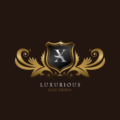 Golden X Logo Luxurious Shield, creative vector design concept for luxury brand identity.