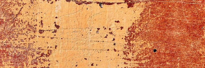 Texture of a concrete wall with cracks and scratches which can be used as a background