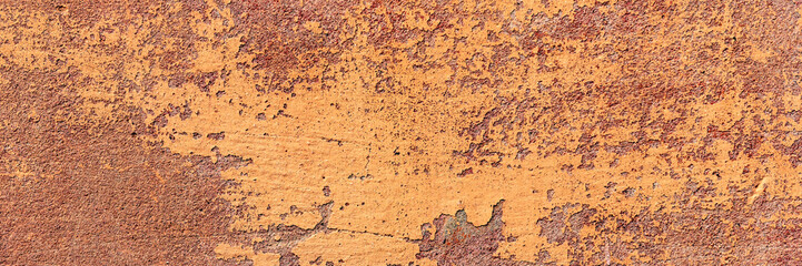 Texture of a concrete wall with cracks and scratches which can be used as a background