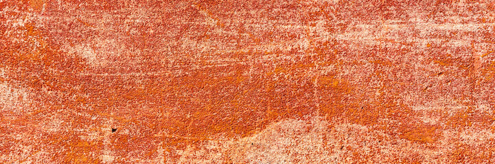 Fototapeta premium Texture of a concrete wall with cracks and scratches which can be used as a background