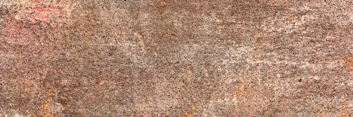 Texture of a concrete wall with cracks and scratches which can be used as a background