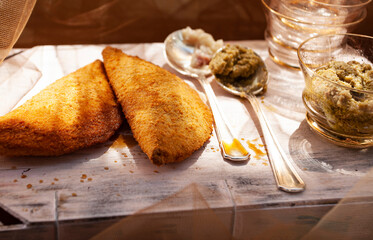Sofficini with mozzarella and ham with olive cream