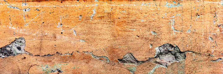 Obraz premium Texture of a concrete wall with cracks and scratches which can be used as a background