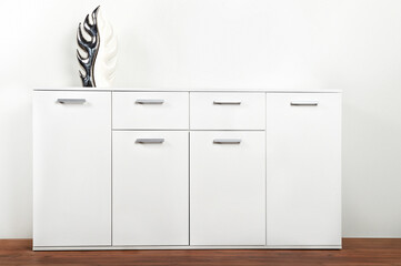 Stylish dresser on white background. Furniture for wardrobe room