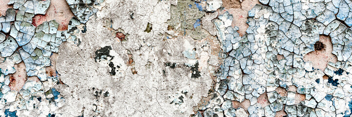 Texture of a concrete wall with cracks and scratches which can be used as a background