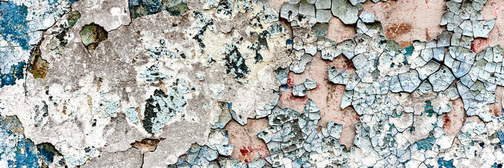 Texture of a concrete wall with cracks and scratches which can be used as a background