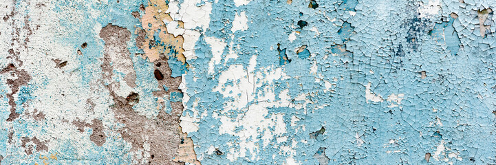 Texture of a concrete wall with cracks and scratches which can be used as a background