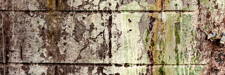 Texture of a concrete wall with cracks and scratches which can be used as a background