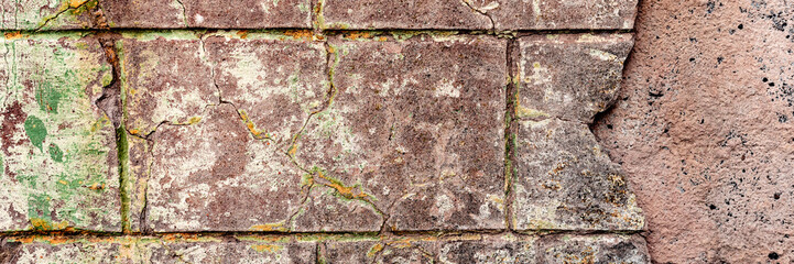 Texture of a concrete wall with cracks and scratches which can be used as a background