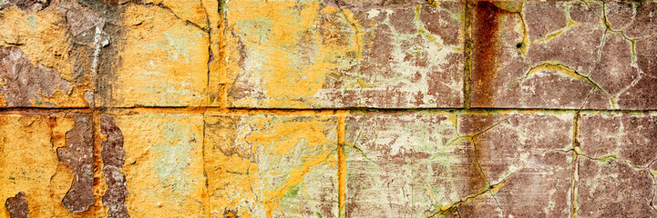 Texture of a concrete wall with cracks and scratches which can be used as a background