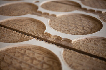 Cutting on a plywood plotter. 