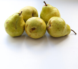 ripe juicy pears on a white background close up