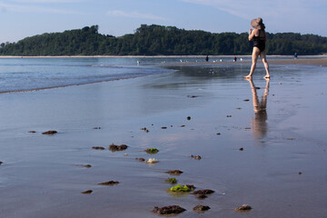 woman walking on the beach