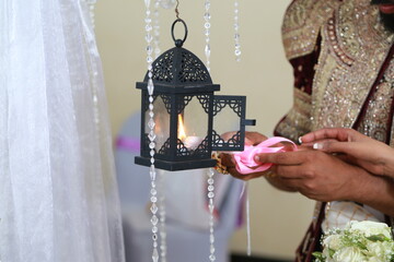 woman holding a lantern