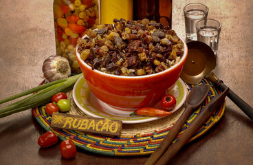 The rubacao dish is typical of northeastern Brazil. In addition to rice, green beans, rennet cheese and beef jerky, it also includes cream or milk. It is wet and tasty.