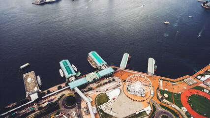 Aerial photo from flying drone of marina port with freight ships in development Shanghai city....