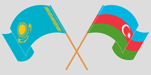 Crossed and waving flags of Azerbaijan and Kazakhstan