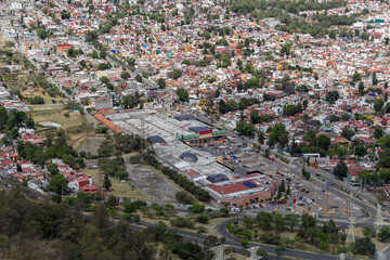 Aerial view of a shopping center in San Mateo, Naucalpan, Mexico beside living area and equestrian center