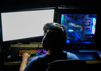 colorful computer workstation and keyboard used by bearded male designer freelancer illustrator