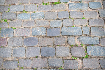 Stone pavement or road in old town as background, vintage cobblestone 