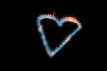 vibrant heart shape burning blue in white snow