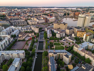 Obraz premium Aerial view of Helsinki city Finland. Sunset Sky and colorful buildings. 