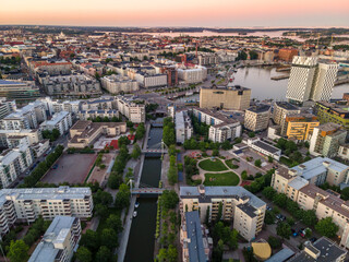 Obraz premium Aerial sunset view of beautiful city Helsinki . Colorful sky and colorful buildings. Helsinki, Finland. 