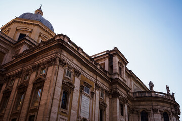 Fototapeta na wymiar Side closeup on the magnificent Saint Peter basilica in Rome