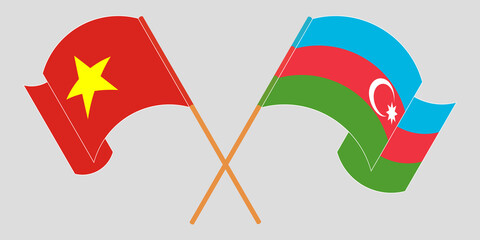 Crossed and waving flags of Azerbaijan and Vietnam