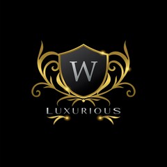 Golden Letter W Luxurious Shield Logo, vector design concept for luxuries business identity