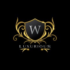 Golden Letter W Luxurious Shield Logo, vector design concept for luxuries business identity