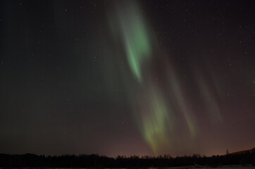 Fototapeta na wymiar majestic aurora borealis over night sky