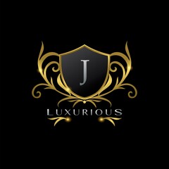 Golden Letter J Luxurious Shield Logo, vector design concept for luxuries business identity