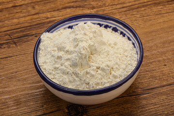 Wheat flour heap in the bowl