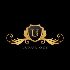 Golden U Logo Luxurious Shield logo design concept.