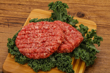 Raw beef burger cutlet for cooking