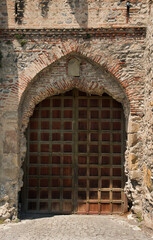 Fototapeta na wymiar Ancient door at Svetitskhoveli Cathedral, Mtskheta, Georgia