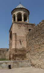 Fototapeta na wymiar Ancient watch tower at the entrance of the Svetitskhoveli Cathedral, Georgia