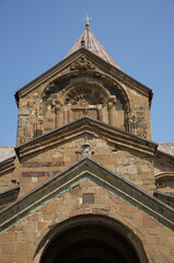 Fototapeta na wymiar Beautifully designed upper portion of Svetitskhoveli Cathedral, Georgia
