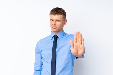 Young handsome businessman making stop gesture with her hand