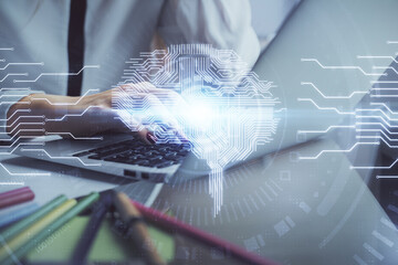 Multi exposure of woman hands working on computer and human brain hologram drawing. Ai tech concept.