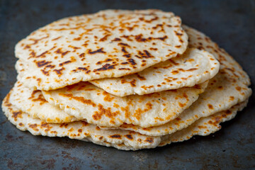 Stack of homemade naan bread