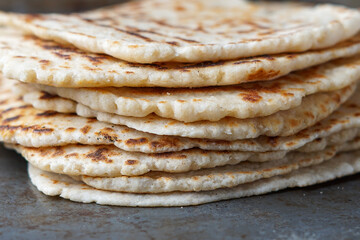 Stack of homemade naan bread